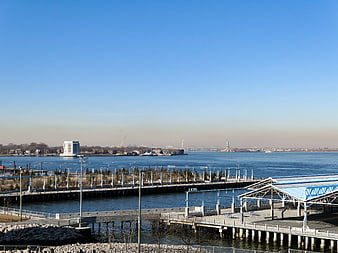 New York Harbor View with Statue of Liberty and Ferry Terminal