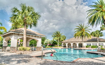 Luxury Resort Pool with Palm Trees and Gazebo