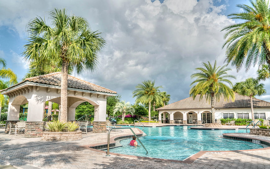 Luxury Resort Pool with Palm Trees and Gazebo