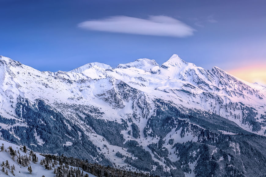 Majestic Snow-Capped Mountain Peaks at Sunset