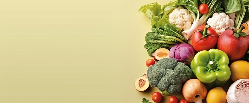Fresh Assorted Vegetables on Beige Background with Copyspace
