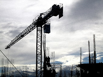 Silhouette of Tower Crane at Construction Site