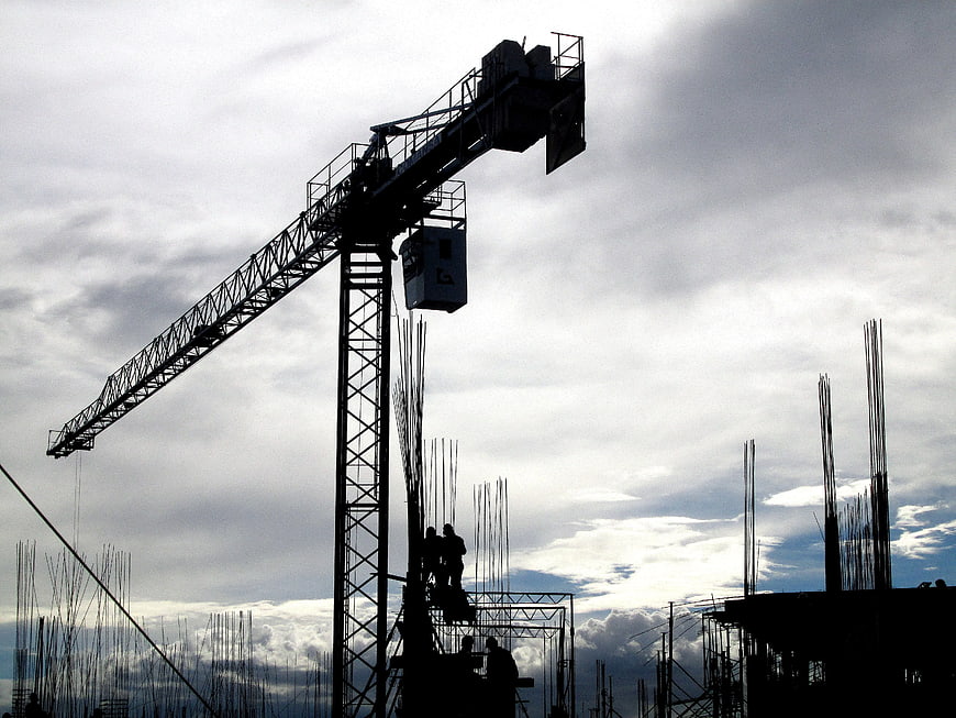 Silhouette of Tower Crane at Construction Site
