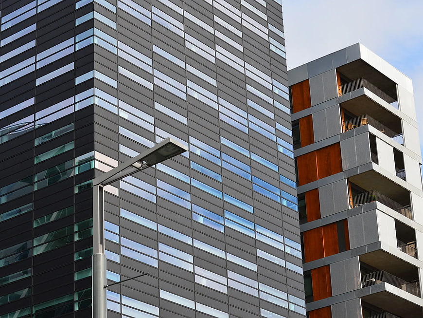 Modern Gray High-Rise Building with Glass Facade