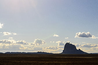 Silhouette of Shiprock Monument in New Mexico Desert Landscape