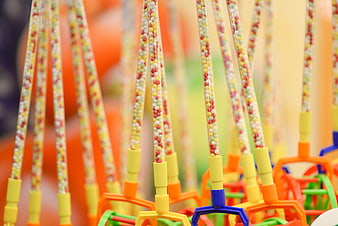 Colorful plastic tubes filled with small beads