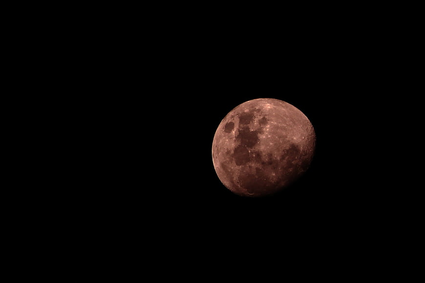 Blood Moon Eclipse in Dark Night Sky