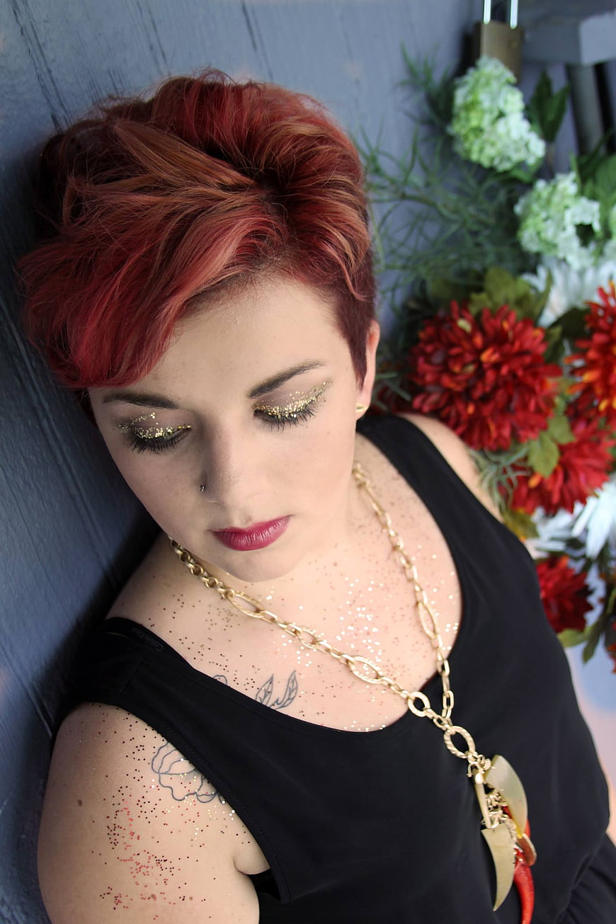 Woman with Red Hair and Glitter Makeup Portrait