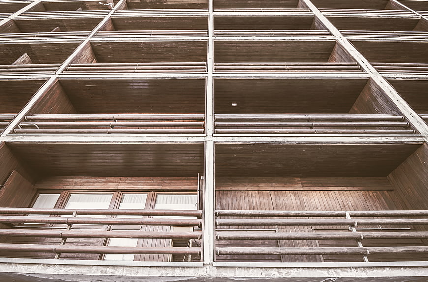 Low angle view of modern wooden apartment balconies