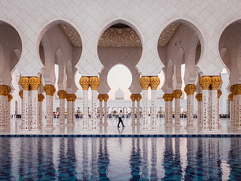 Grand Mosque Interior with Arches and Reflections