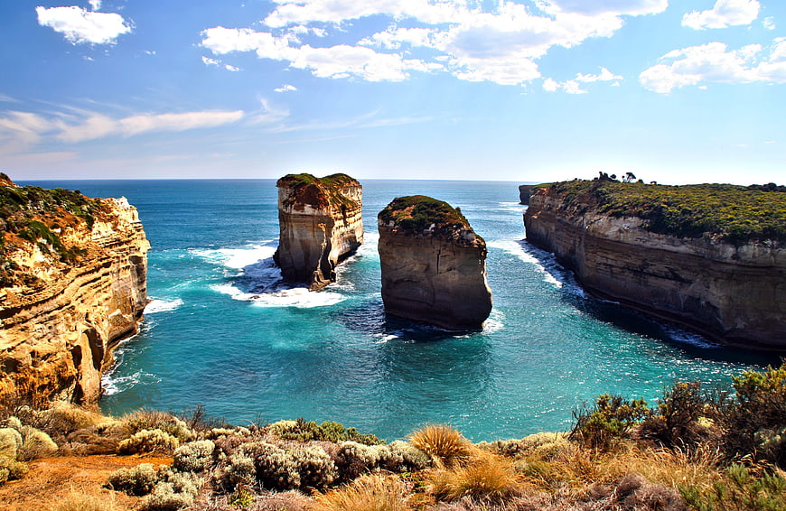 Turquoise Ocean View Of Coastal Rock Formations And Cliffs