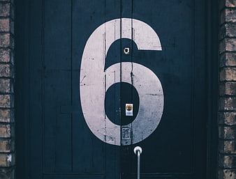 Vintage Number Six on Dark Blue Wooden Door