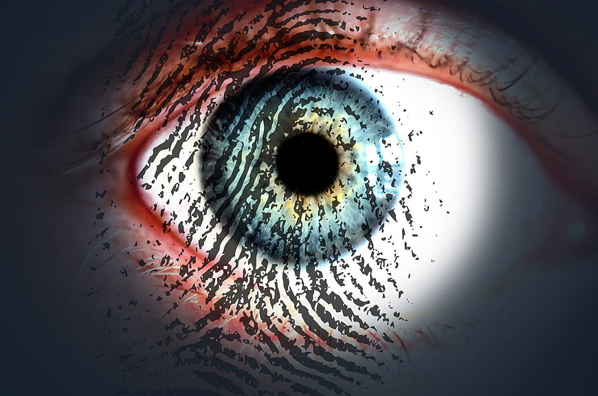 Blue eye with fingerprint overlay for security concept