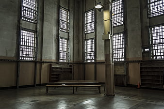 Historic Alcatraz Prison Interior With Barred Windows And Concrete Walls