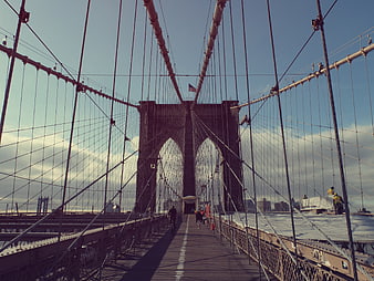 Brooklyn Bridge Walkway with Cyclist and Pedestrians
