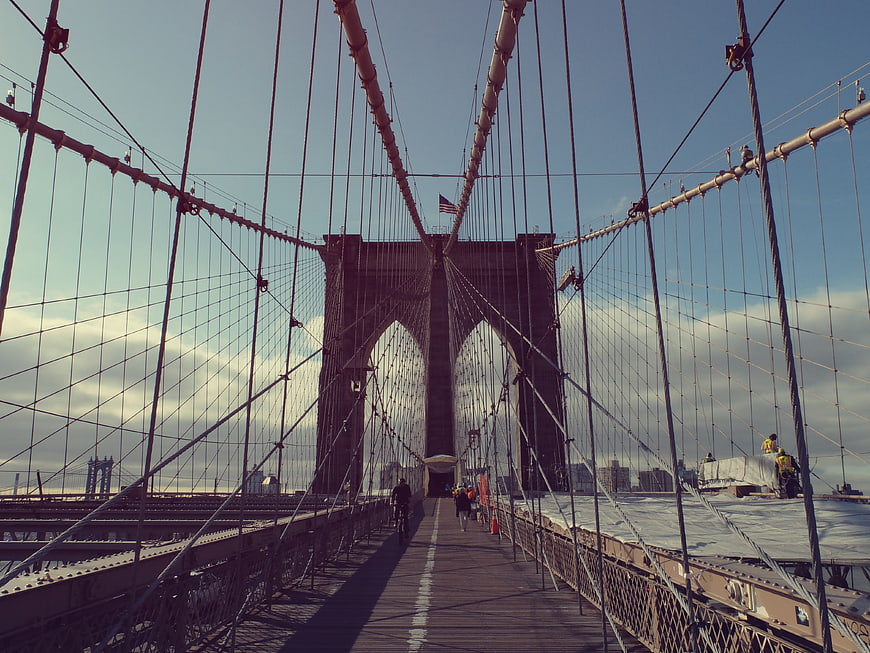 Brooklyn Bridge Walkway with Cyclist and Pedestrians