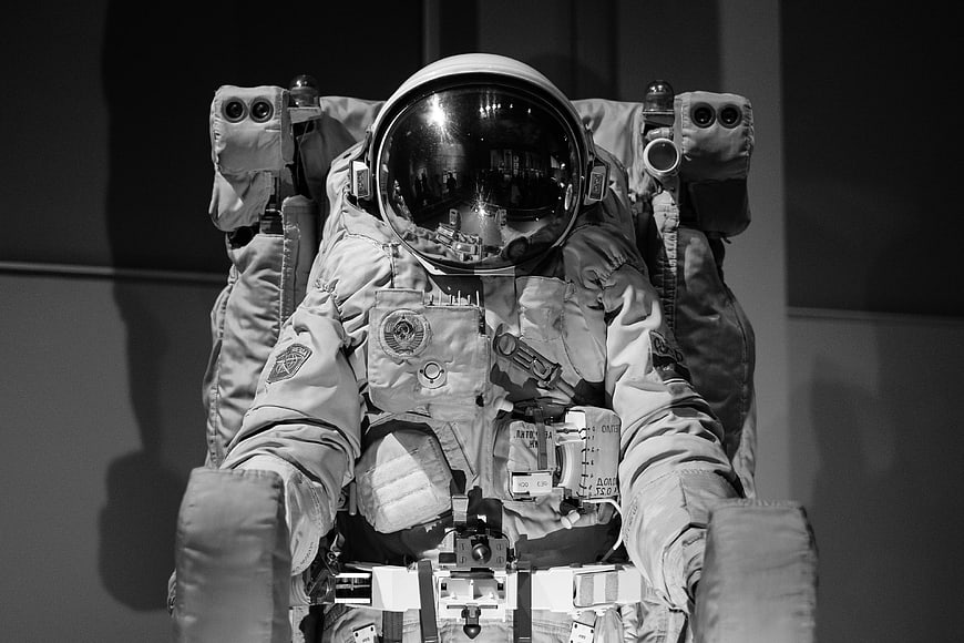 Black and white portrait of a cosmonaut in a space suit