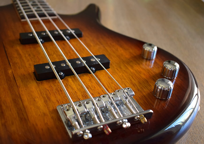 Close-up of Brown Electric Bass Guitar Body and Hardware