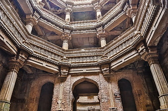 Intricate stone architecture of an ancient Indian stepwell interior