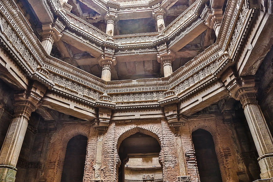 Intricate stone architecture of an ancient Indian stepwell interior