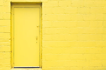Minimalist Yellow Brick Wall with Matching Door