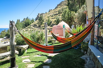 Colorful Hammocks in a Scenic Garden with Mountain View