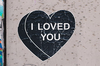 Peeling Heart Sticker with I Loved You Text on Wall