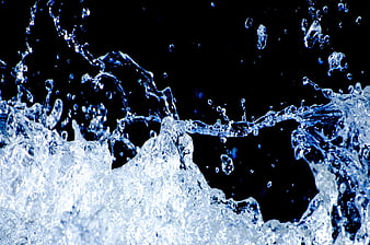 Dynamic Blue Water Splash On Black Background