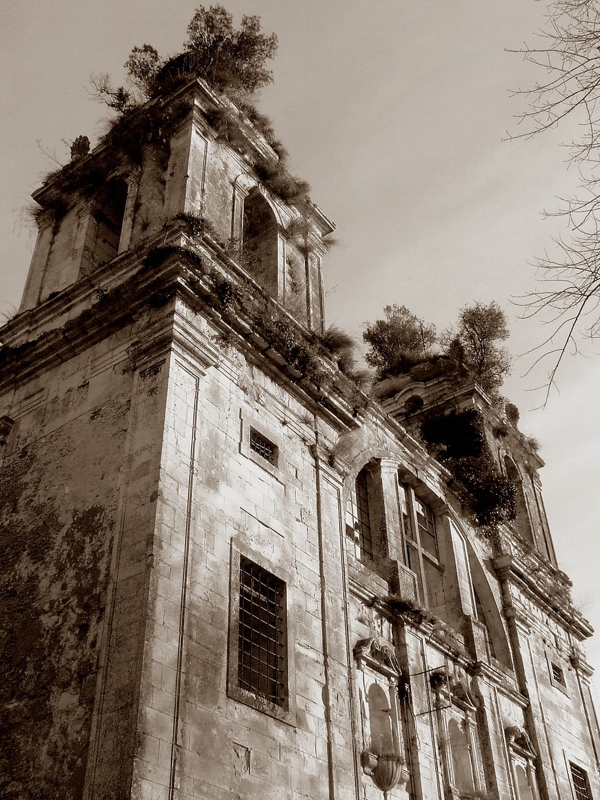 Sepia low angle view of abandoned monastery ruins