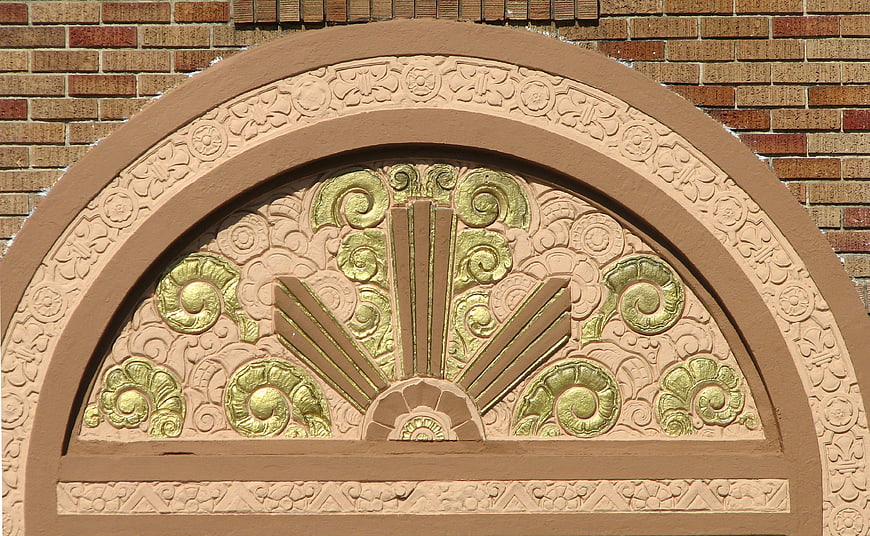 Art Deco Archway Detail with Gold and Beige Relief Patterns