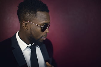 Stylish Black Man in Suit and Sunglasses Portrait