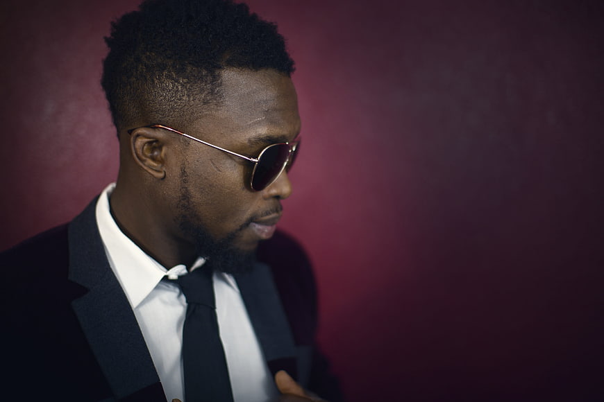 Stylish Black Man in Suit and Sunglasses Portrait