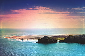 Vintage Green Island Beach Sunset with Pink Sky