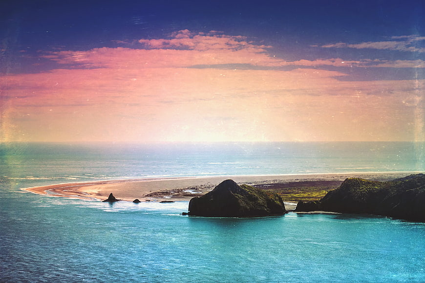 Vintage Green Island Beach Sunset with Pink Sky