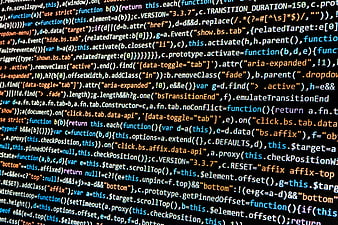 Close-up of computer code syntax highlighting on dark screen