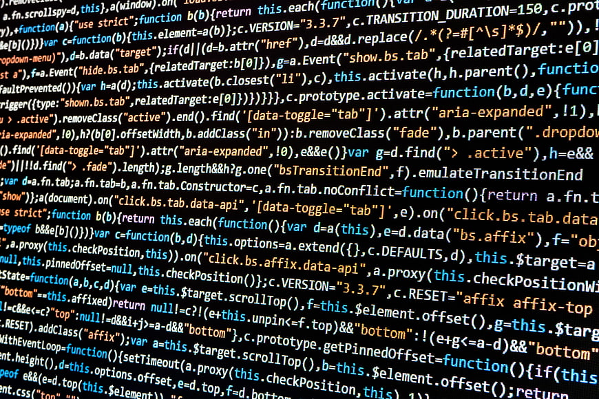 Close-up of computer code syntax highlighting on dark screen