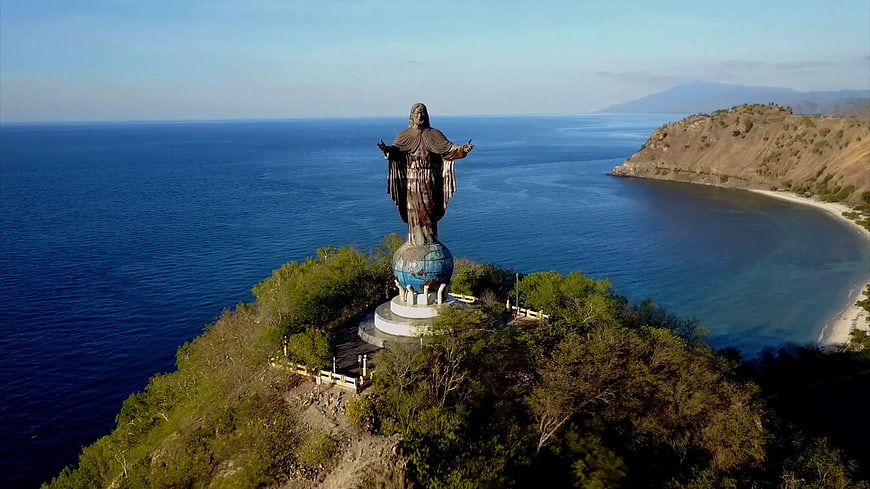 Aerial view of Christ the Redeemer statue overlooking the ocean