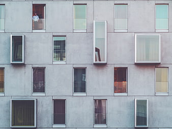 Modern Concrete Building Facade with Asymmetrical Windows