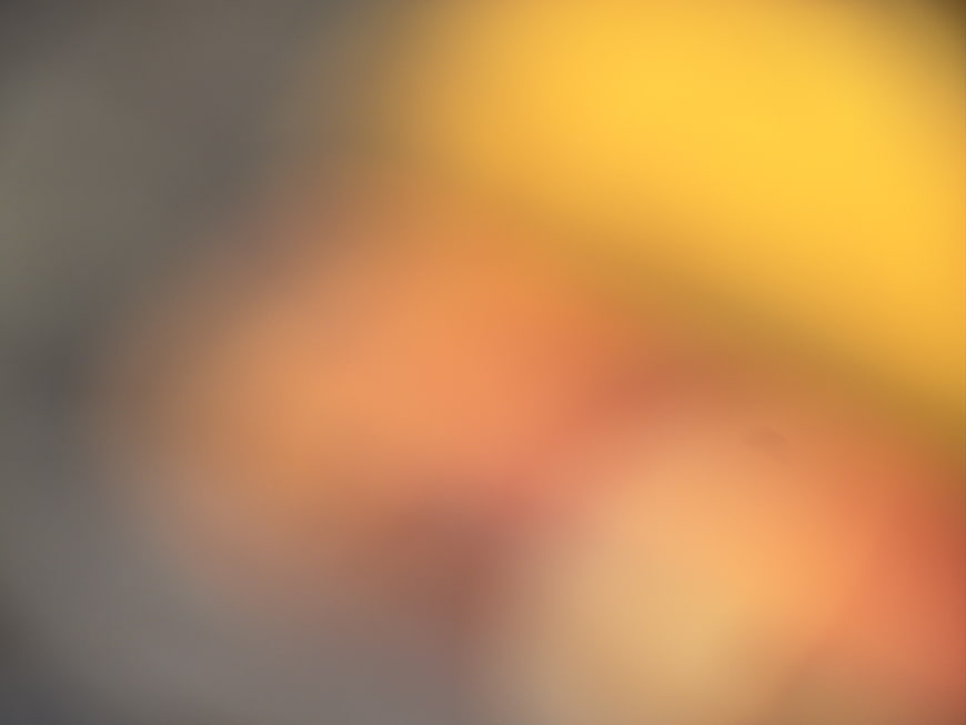 Abstract Blurred Background with Warm Yellow and Orange Gradient