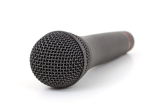 Black handheld microphone on white background