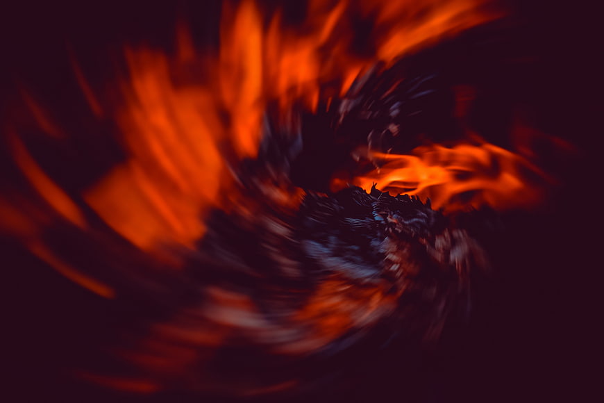 Abstract Swirling Fire Flames Dark Background