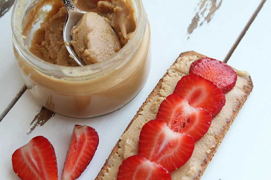 Strawberry Peanut Butter Toast on White Wooden Table