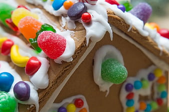 Close-up of colorful candy decorated gingerbread house roof