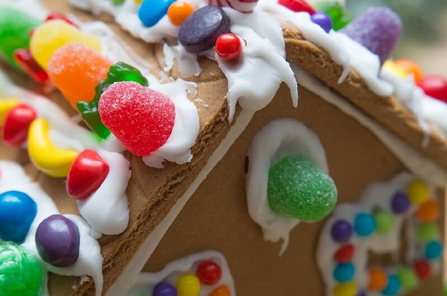Close-up of colorful candy decorated gingerbread house roof