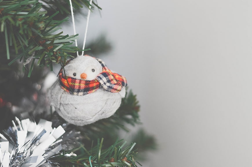 Cute Felt Snowman Ornament on Christmas Tree Branch