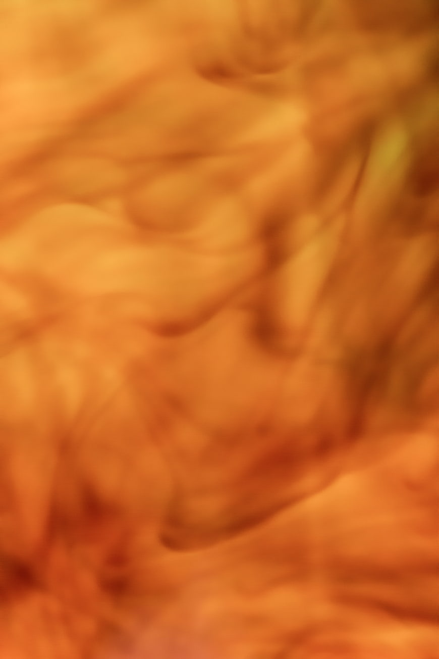 Abstract orange liquid swirl texture background
