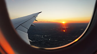 Airplane Wing Sunset View from Window