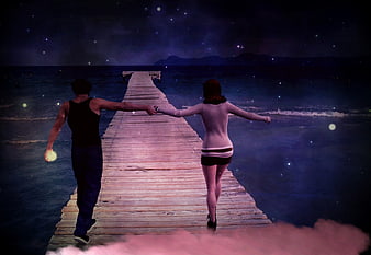 Couple holding hands walking on pier at night with fireflies