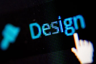 Close-up of digital design text on screen with cursor