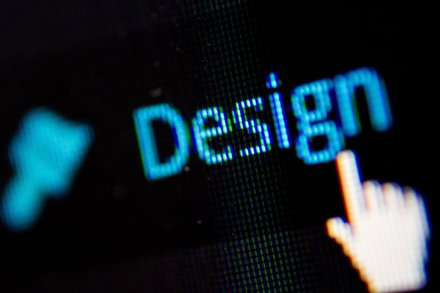 Close-up of digital design text on screen with cursor